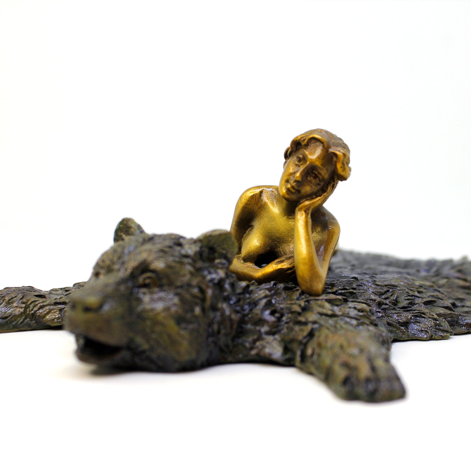 Bronze Sculpture - a Woman on a Bearskin